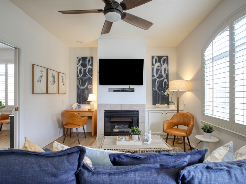 Bright, contemporary space with a cozy fireplace.