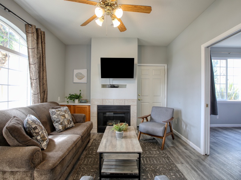 Escape to the coast at Pacific Plaza #604 - Coral Condo. This charming one-bedroom condo features a king bed, sleeper sofa, full kitchen, private patio, and shared hot tub and BBQ access — all just a short stroll from the sun and shore.