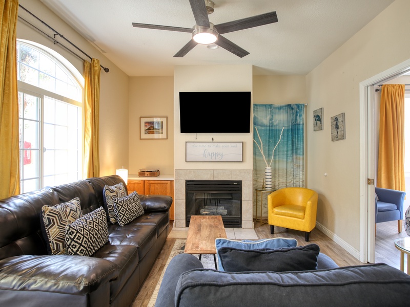 A living room made for laughter, lounging, and late-night snacks.