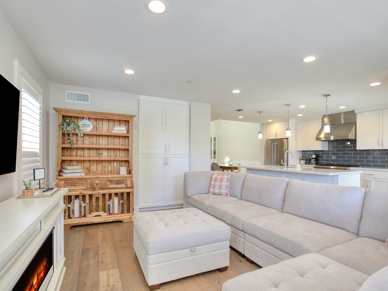Stretch out on the roomy sectional, sip a refreshing drink, and let the calming sounds of the waves ease you into relaxation.