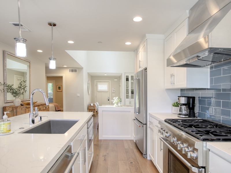 Whether you love to cook or simply gather, this kitchen is the heart of the home.