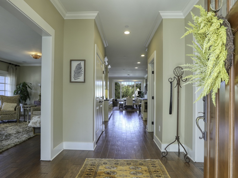 Step through the grand entry door into a truly spacious home, ready to welcome you for both short-term getaways and extended mid-term stays.